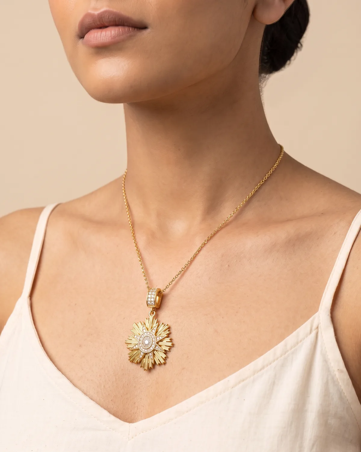 Golden Nova: Celestial Sunburst Pendant Necklace with Pavé Crystal Centerpiece