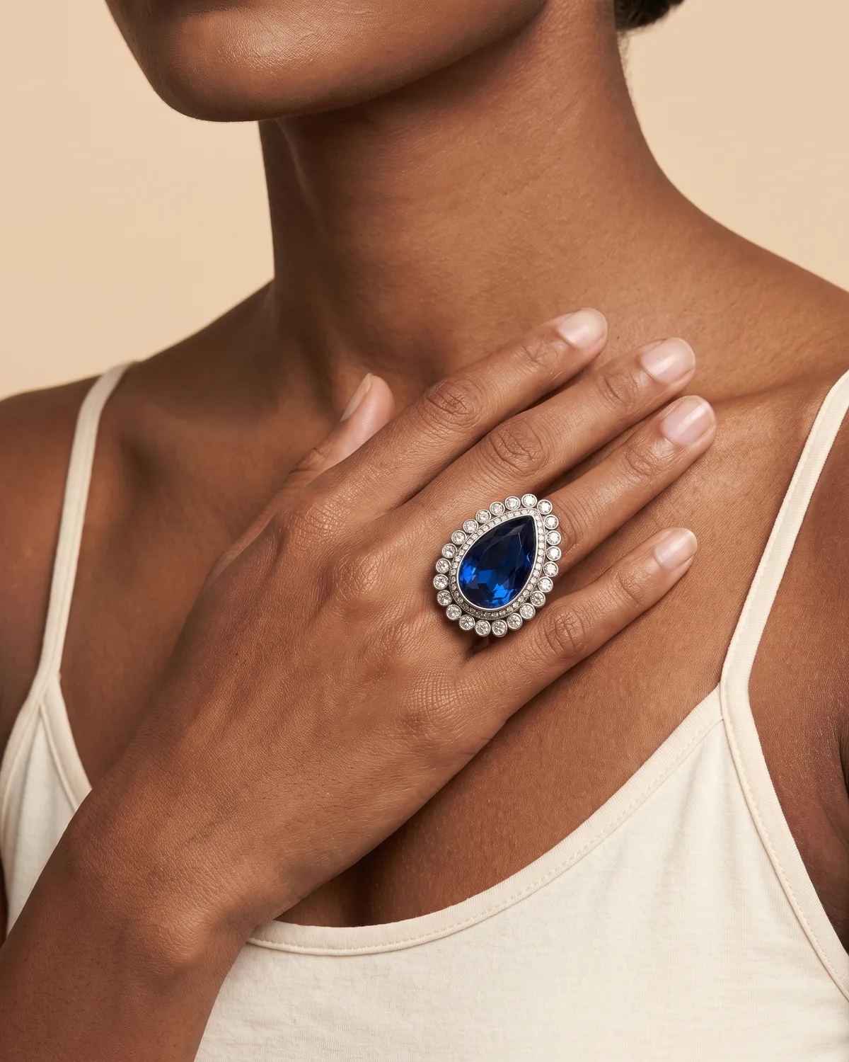 Midnight Teardrop: Royal Sapphire Blue Pear-Cut Cocktail Ring with Crystal Halo