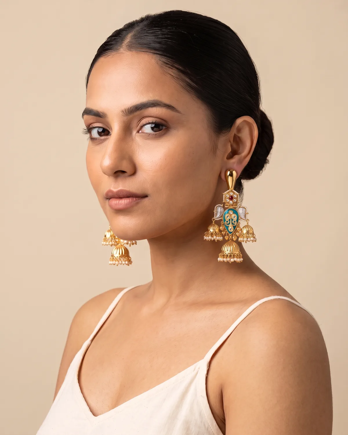 Pankh-Paryali: Royal Dual-Tone Jhumka Earrings with Enamel and Pearl Details