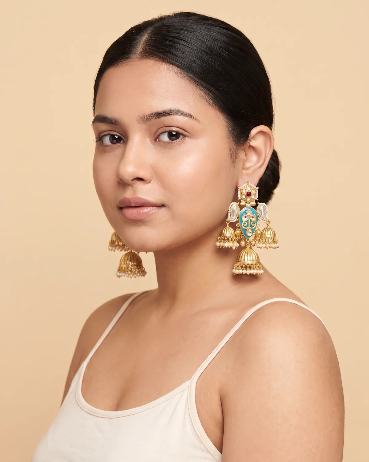 Raj-Nandini: Maharaja Peacock Blue Tiered Jhumka Earrings with Kundan & Pearl Accents