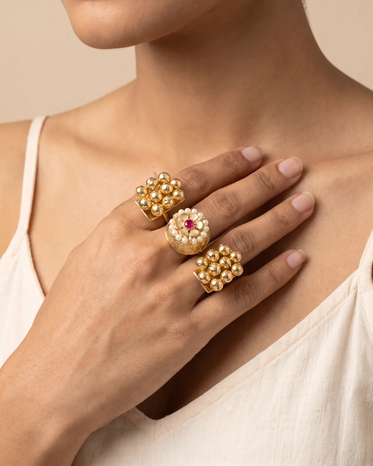 Shahi Gulab: Regal Gold Dual-Finger Statement Ring with Central Floral Jhumka & Ruby Accents
